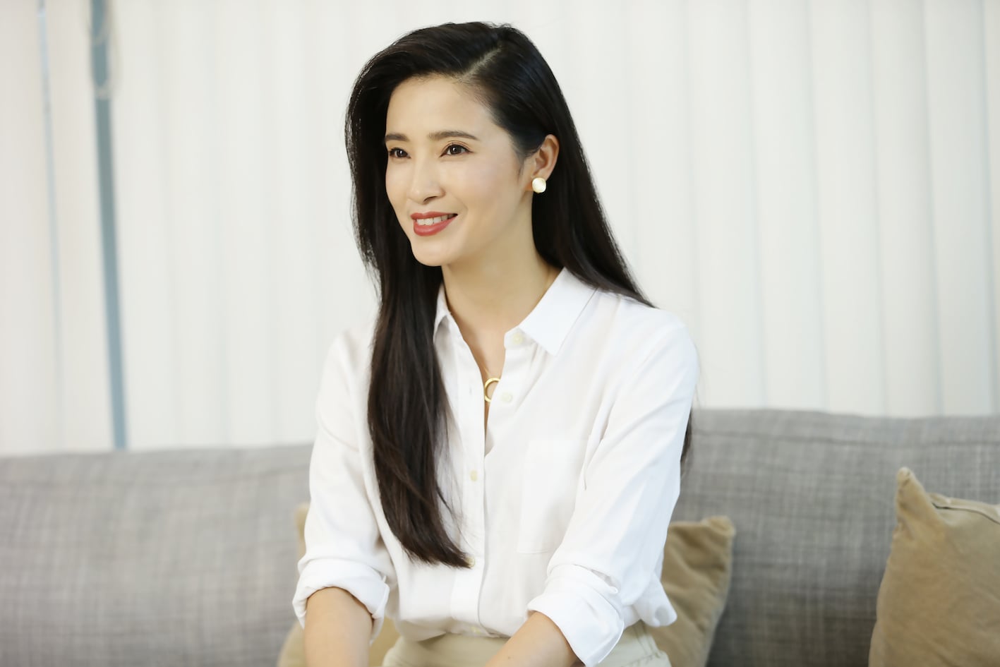 Gong Beibi on couch